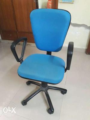 It is a blue color Godrej office chair. It is