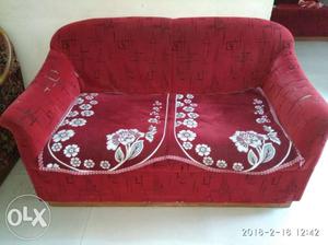 Red And White Floral Fabric Sofa