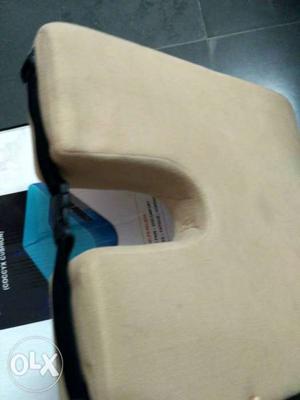 Renewable wedge sitting cushion for back pain and