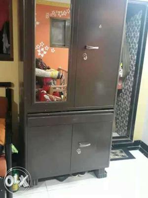 This is a metal cupboard in a good condition with