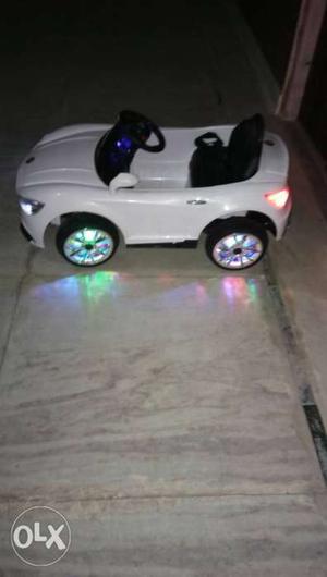 Toddler's White And Black Ride-on Vehicle