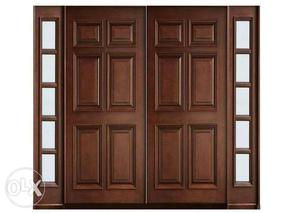 Two Brown Wooden 6-panel Doors