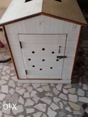 White And Brown Wooden Doghouse