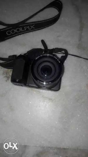 Black Nikon Coolpix DSLR Camera