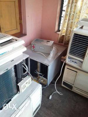Five White Window-type Air Conditioners