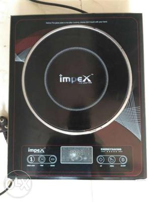 Impex touch type induction cooker,good working