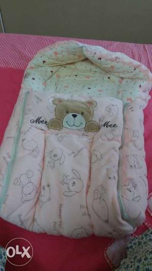 Packed Mee Mee baby carrier or wrapper