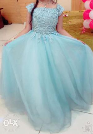 Beautiful Barbie doll Gown in light blue shade.