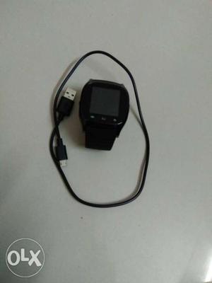 Black Smart Watch With Cable