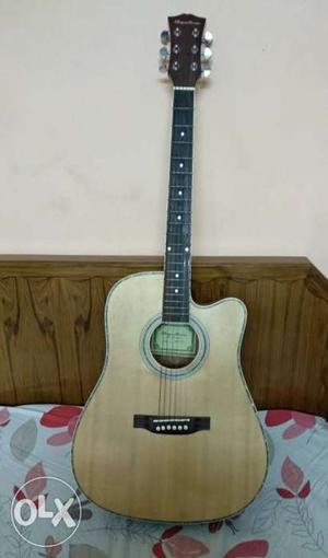 Brown cutaway, acoustic spectrum guitar