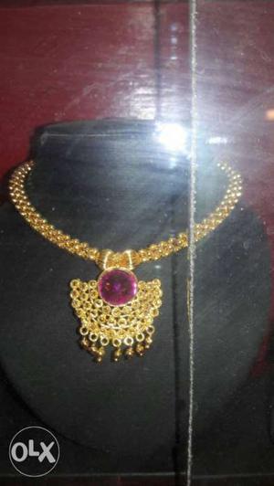 Gold And Pink Gemstone Necklace