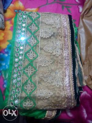 New net sari wid blouse piece