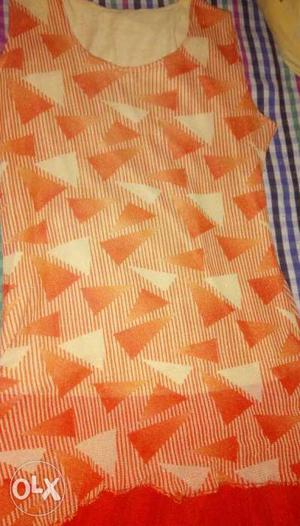 Orange frock with shiny material size-short