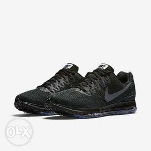 Pair Of Black Nike Zoom