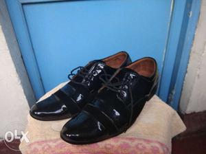 Pair Of Black Shiny shoes
