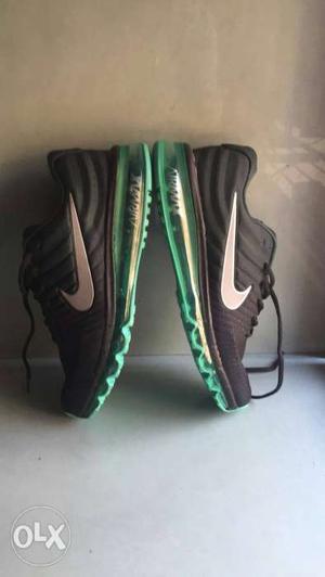 Pair Of Black-and-green Nike Airmax Running Shoes