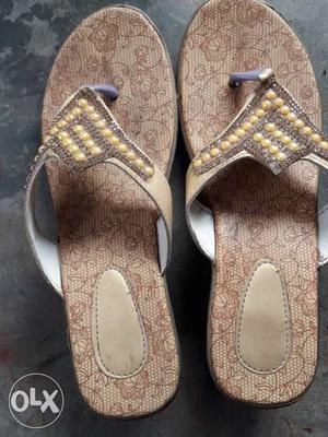 Pair Of Brown Slide Sandals