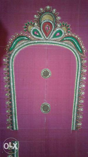 Pink, Green, And White Paisley Textile
