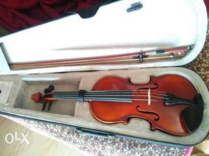 Brown Violin With White Case