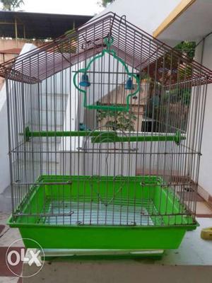 Green And Red Metal Birdcage