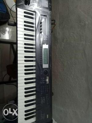 Korg T R keyboard with stand, adaptor,cover