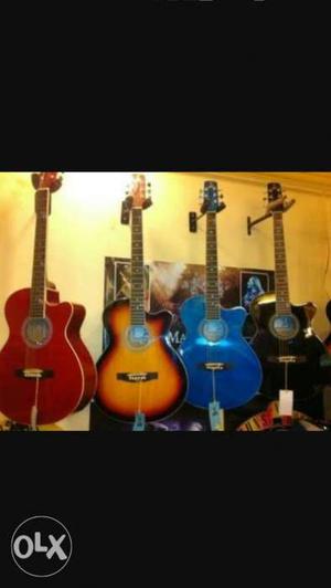 Red, Orange, Blue, And Black Acoustic Guitar