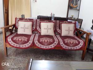 3 seater sofa made of seasoned wood,complete with covers &