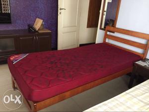 A pair of 6*3 wooden cots with 'curlon' coir