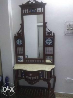 An ethnic and traditional dressing table with