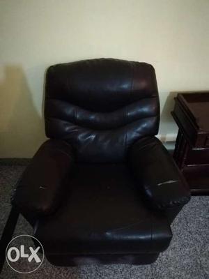 Black upholstery Recliner in working condition.