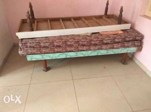 Brown And Teal Wooden Bed