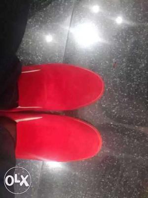 Pair Of Red Low-top Shoes