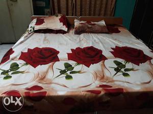 Red And Beige Floral Bedspread