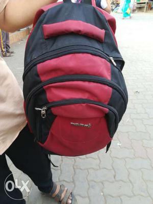 Red And Black Fabric Backpack