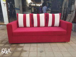 Red and white fabric sofa