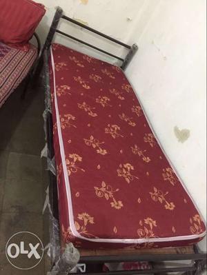 Single bed with foam mattress. its a metal body