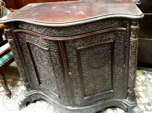 Teak wood cabinet with beautiful carvings.