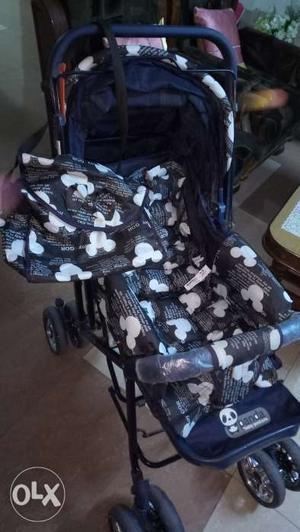 Very good condition baby stroller with baby bag and mosquito
