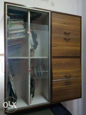 A wooden bookshelf which can be hanged in wall..