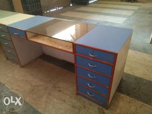 Blue And Brown Wooden Pedestal Desk."price negotiable".