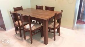 Rectangular Brown Wooden Table With Four Chairs Dining Set
