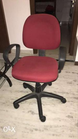 Red revolving office chair
