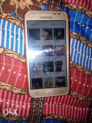 Samsung j2 good condition. Only 2monts.earphones