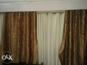 Set of 12 white and printed curtains. white