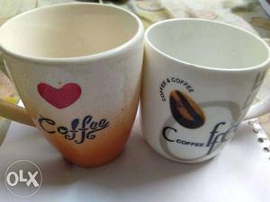 Two White And Brown Ceramic Mugs