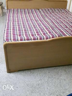 Two yrs old box pattern bed with mattress.