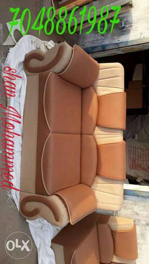 White And Brown Leather Sofa Chair