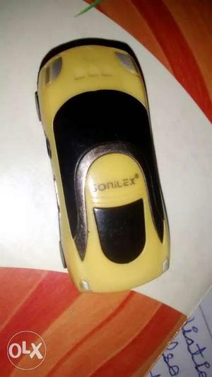 Yellow And Black Plastic Toy Car