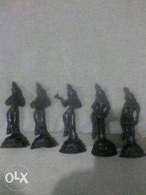 Four Black Character Figurines