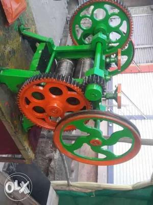 Green And Orange Industrial Machine